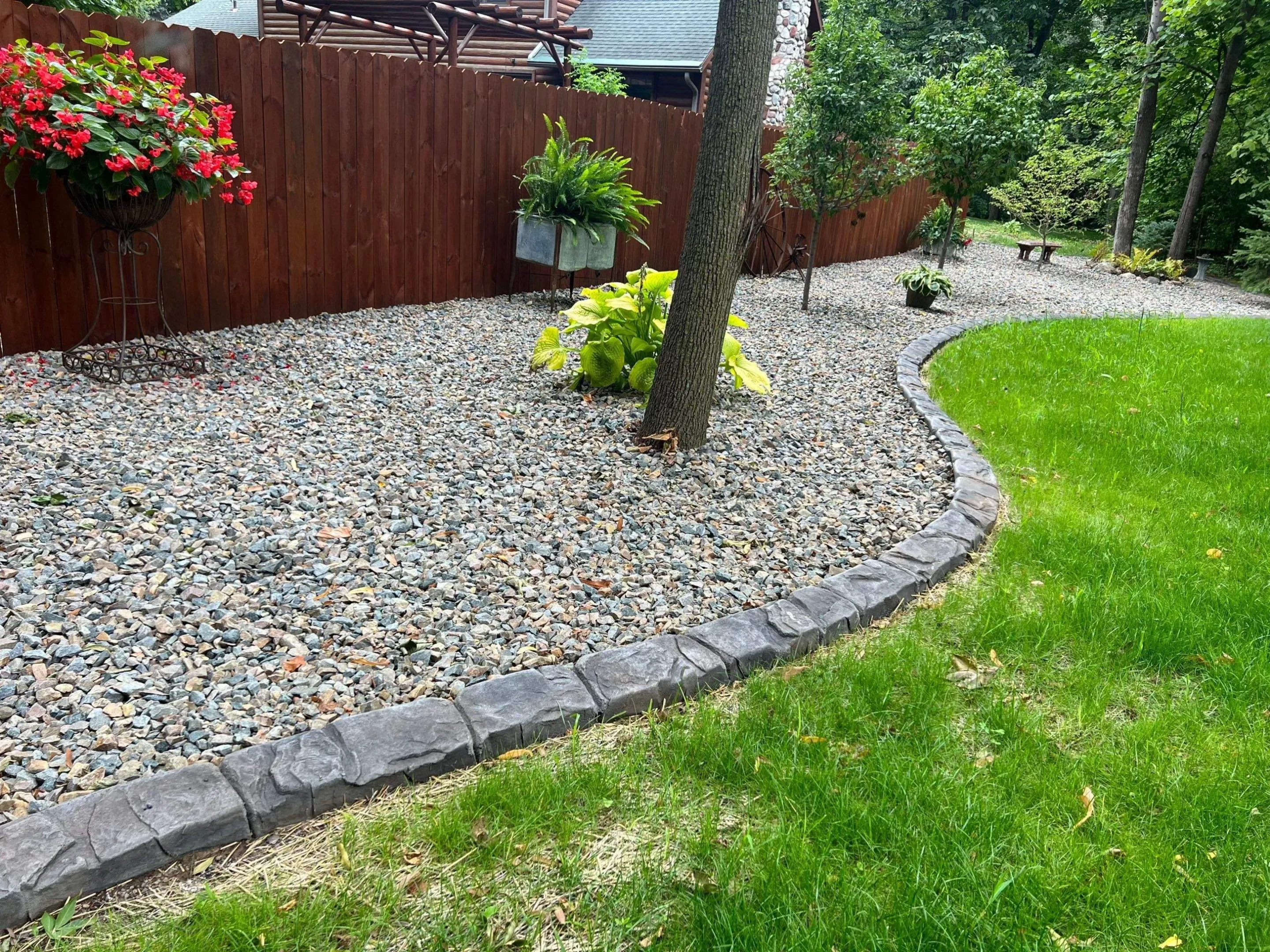 Landscape curbing along a garden bed in a Indiana and Michigan yard