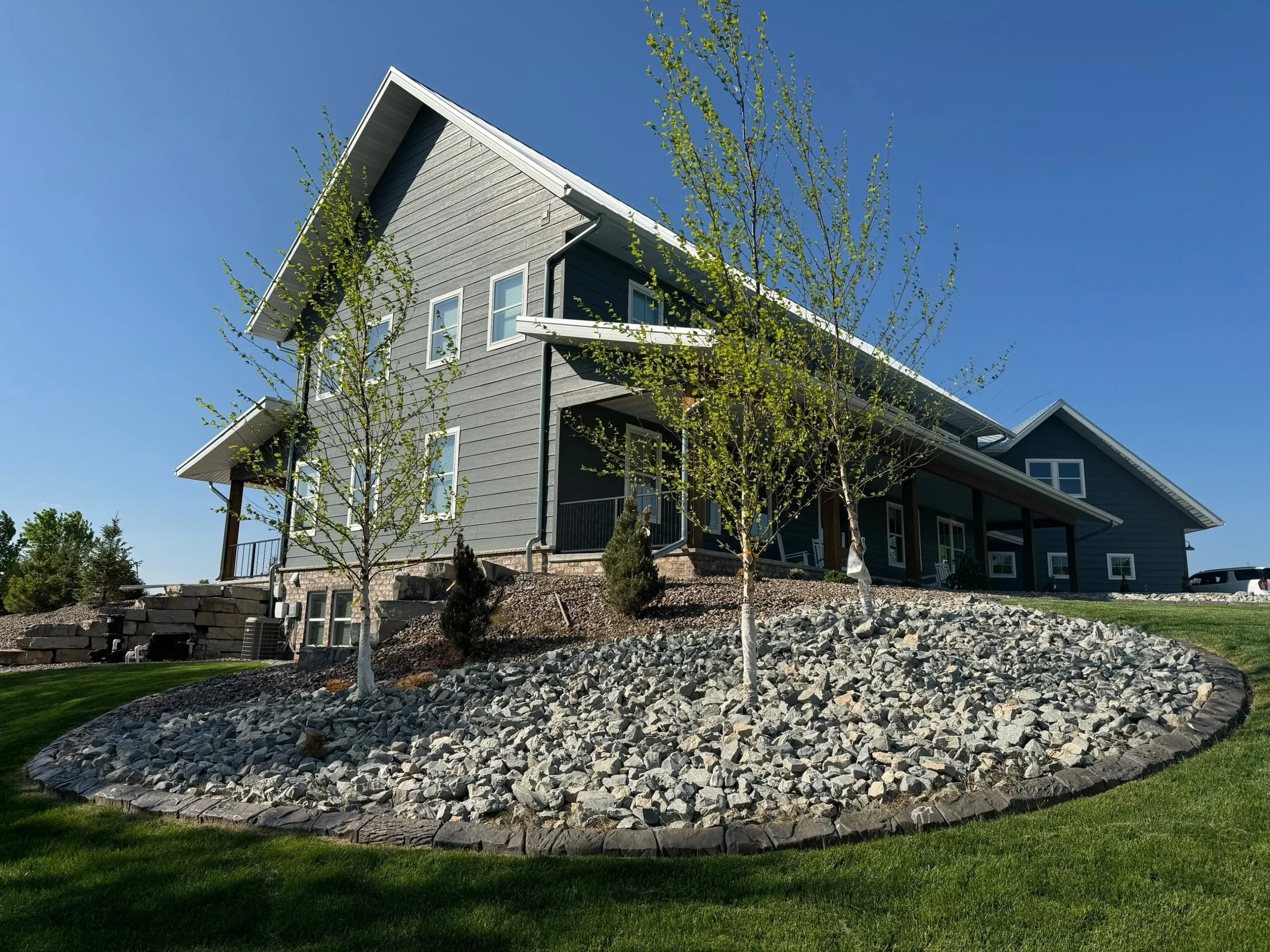 Completed landscape curbing project showcasing expert craftsmanship Completed landscape curbing project showcasing expert craftsmanship