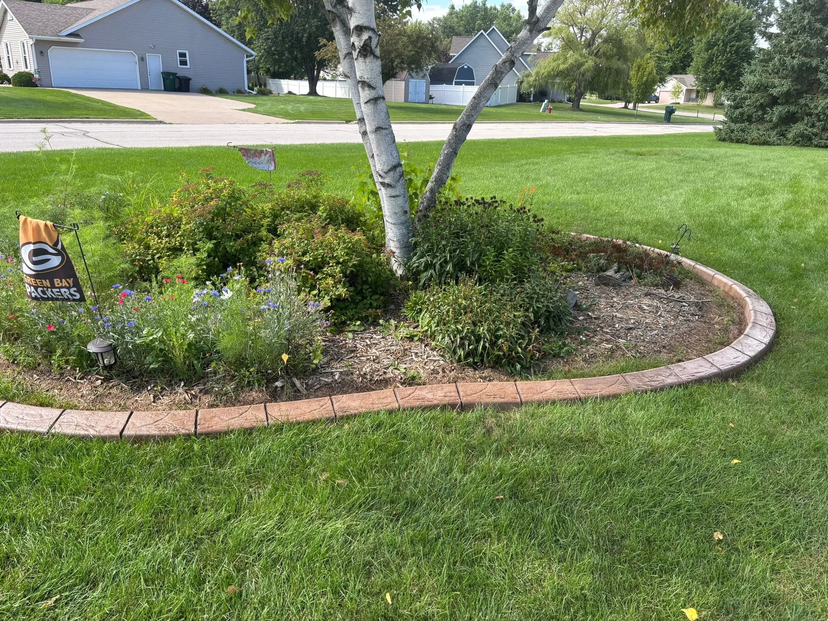 Tree ring curbing around mature oak tree